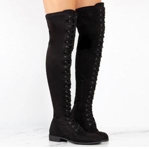 Black lace up knee-high boots